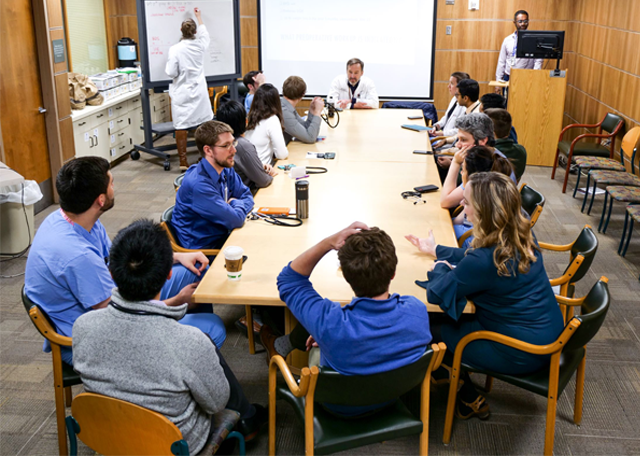 Image of IM Residency faculty and residents in conference room
