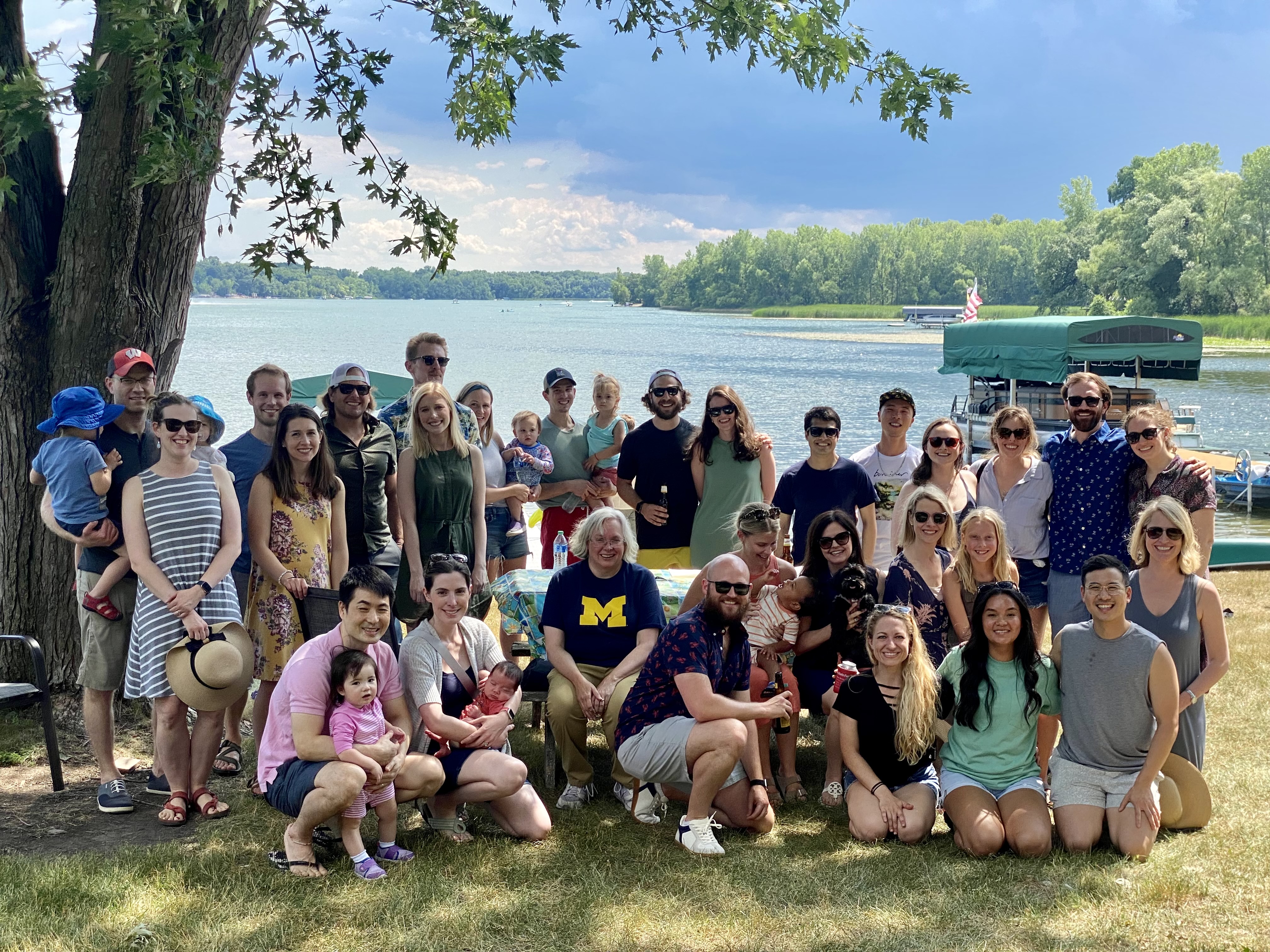 Residents and Family photo at a lakeside