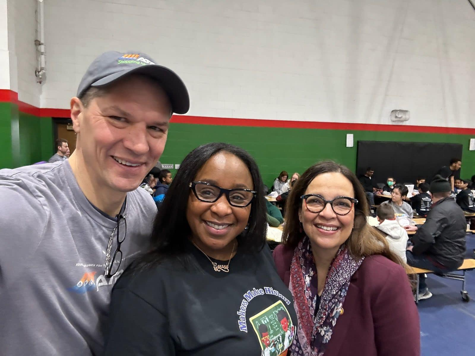 (Left to right), UMN IEM Director John Bischof, Jalonda Combs, and UMN Office for Equity and Diversity VP Mercedes Ramírez Fernández at a STEM Saturday event