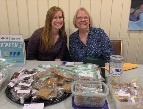 MNPI Supports volunteers at a bake sale