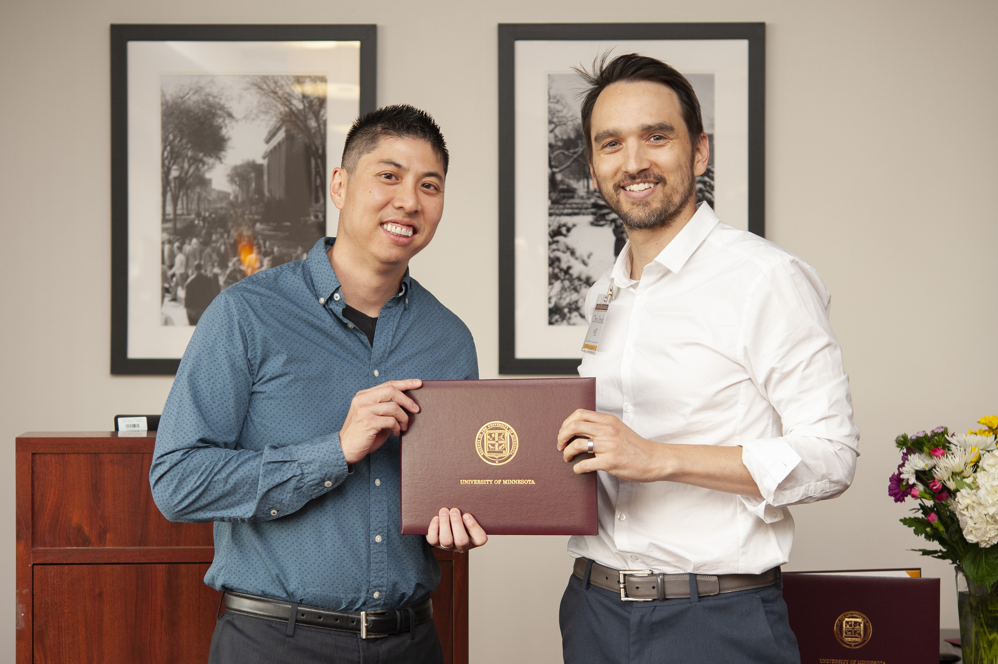 Dr. Streib presenting Dr. Nguyen with his diploma