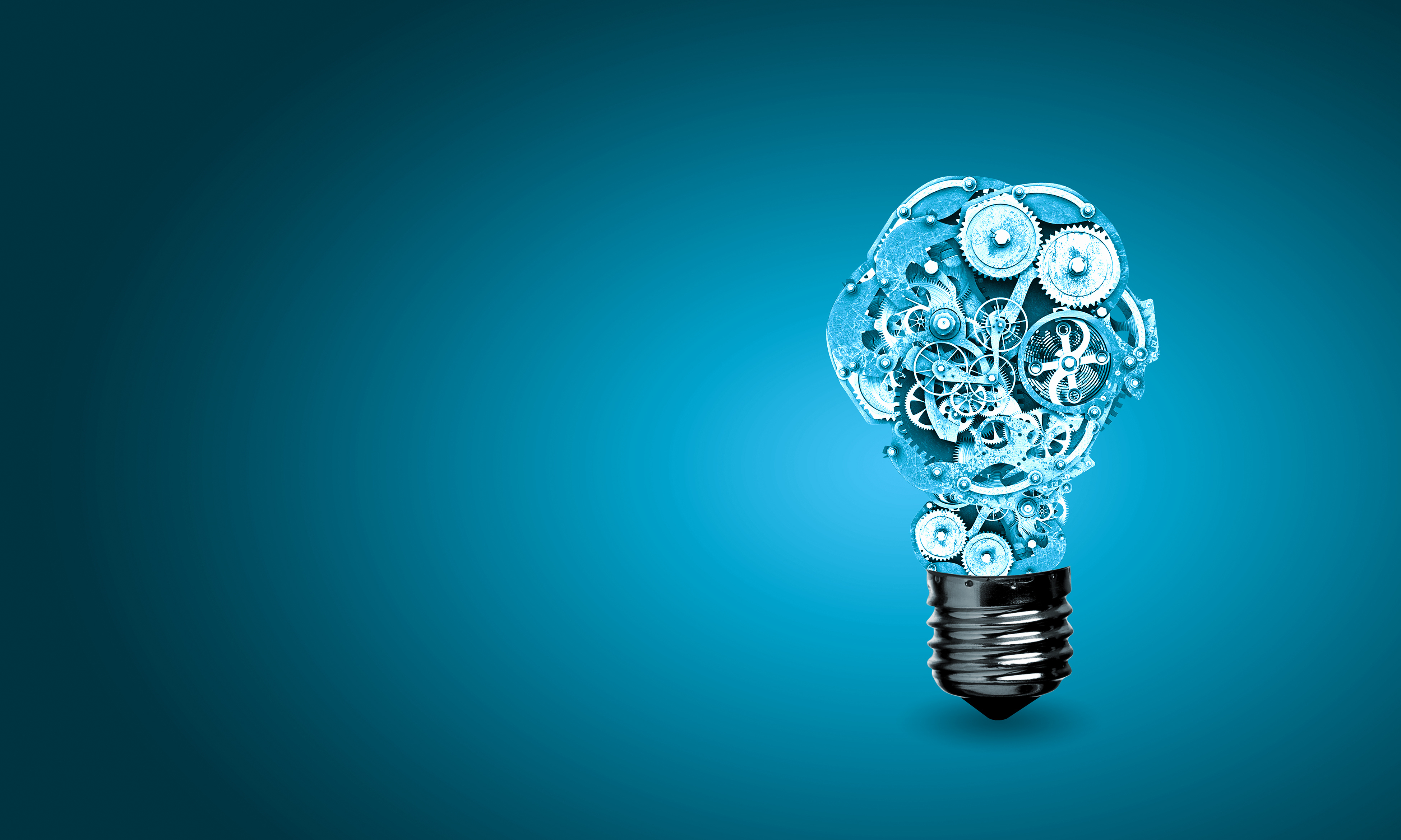 Blue background with lightbulb made of gears