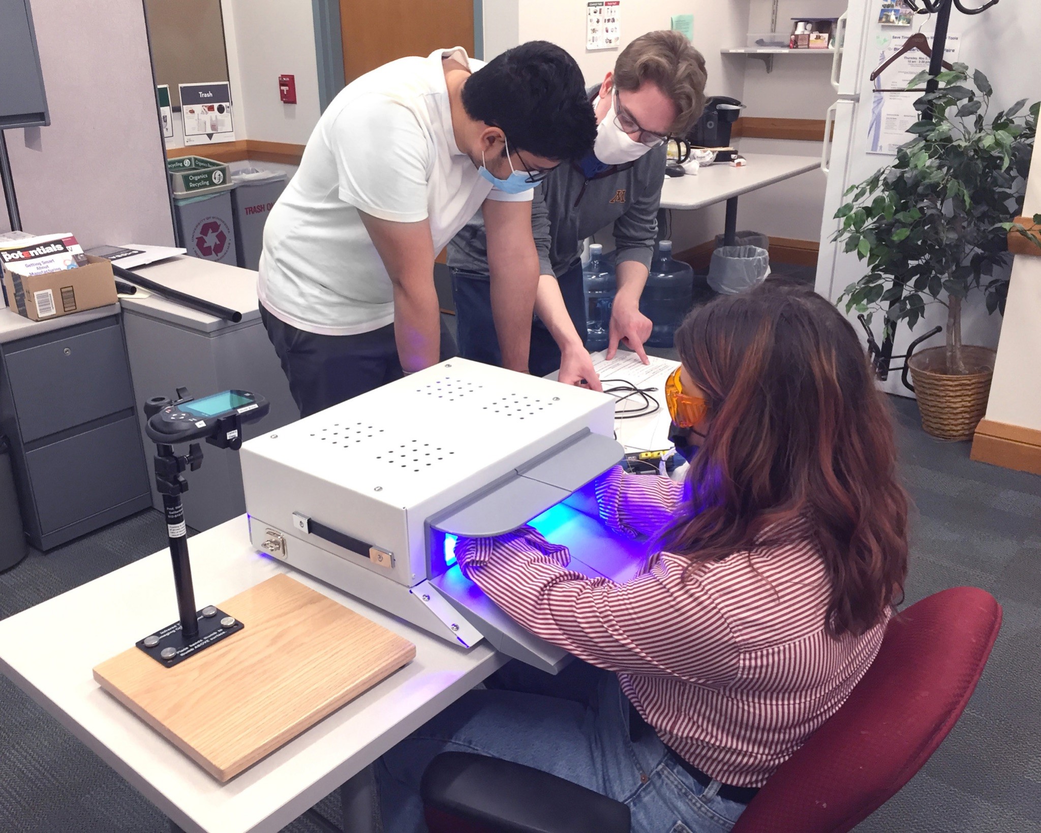 A Photo(therapy) Opportunity - Kushal Sehgal, James Kerber, and Emily Wagner performing a test run of the study protocol with the phototherapy device 