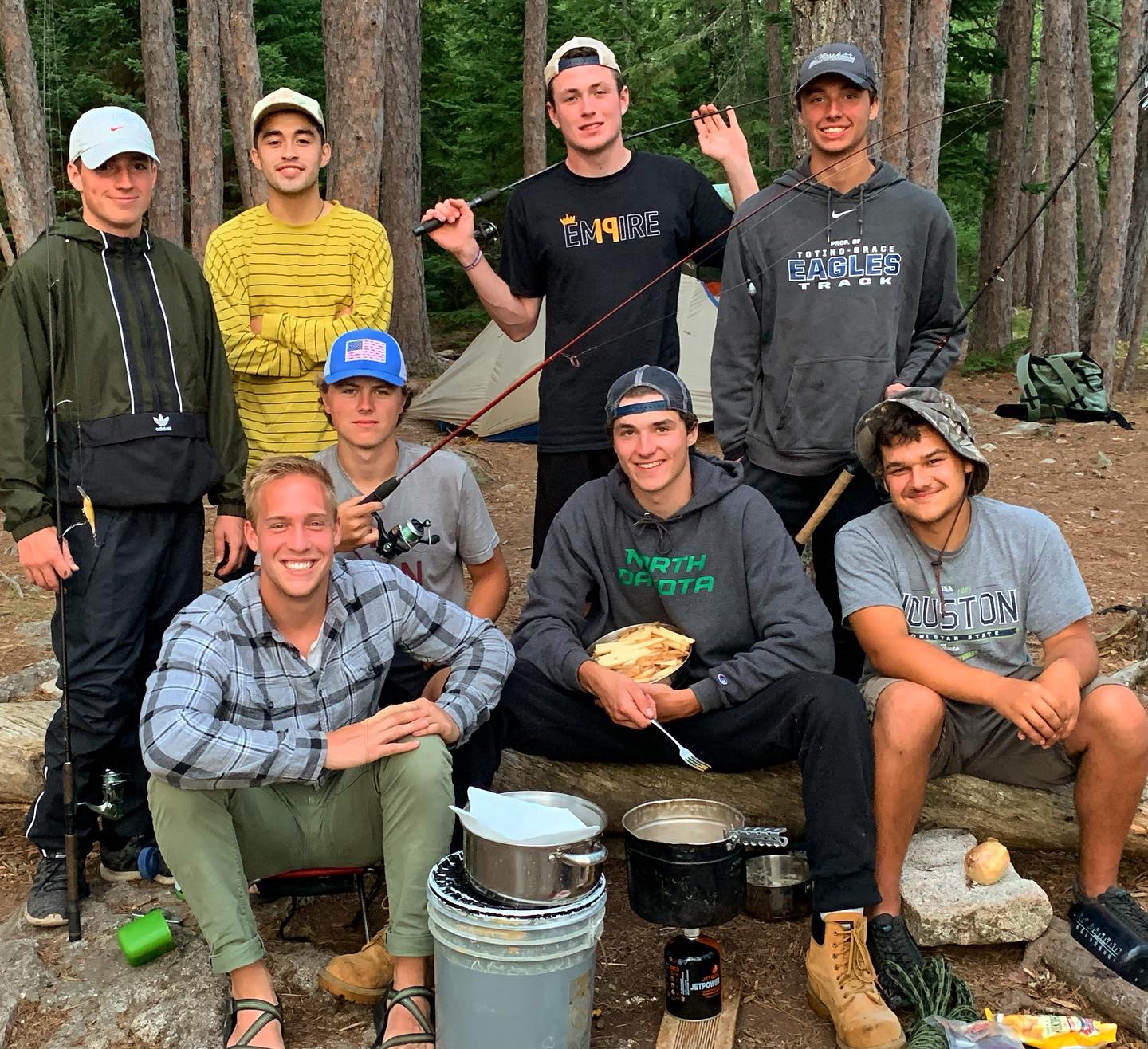 Michael Kelly (bottom left) leading a Boundary Waters trip for young men