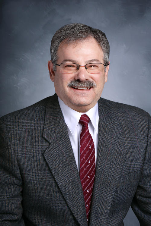 Dr. Michael Miner