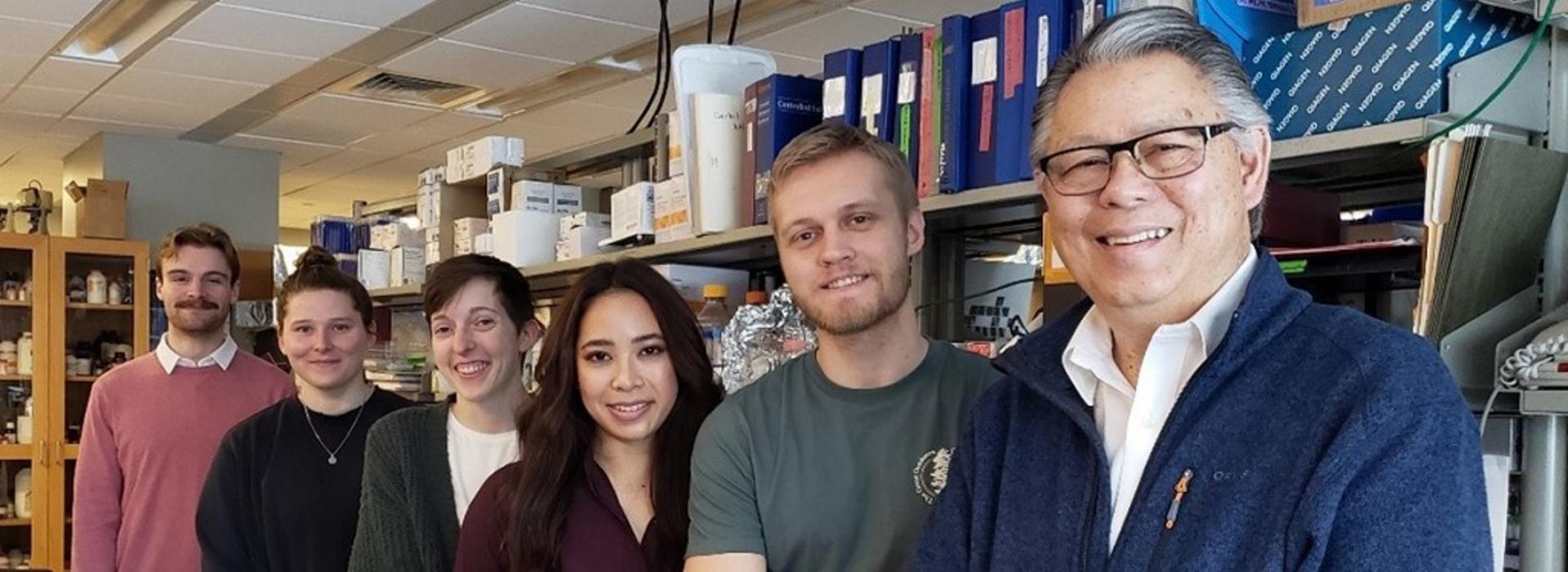 Dr. Walter Low (at right) with a few of his graduate students and post docs.