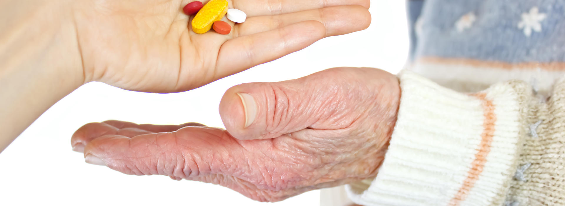 dietary supplements in hand