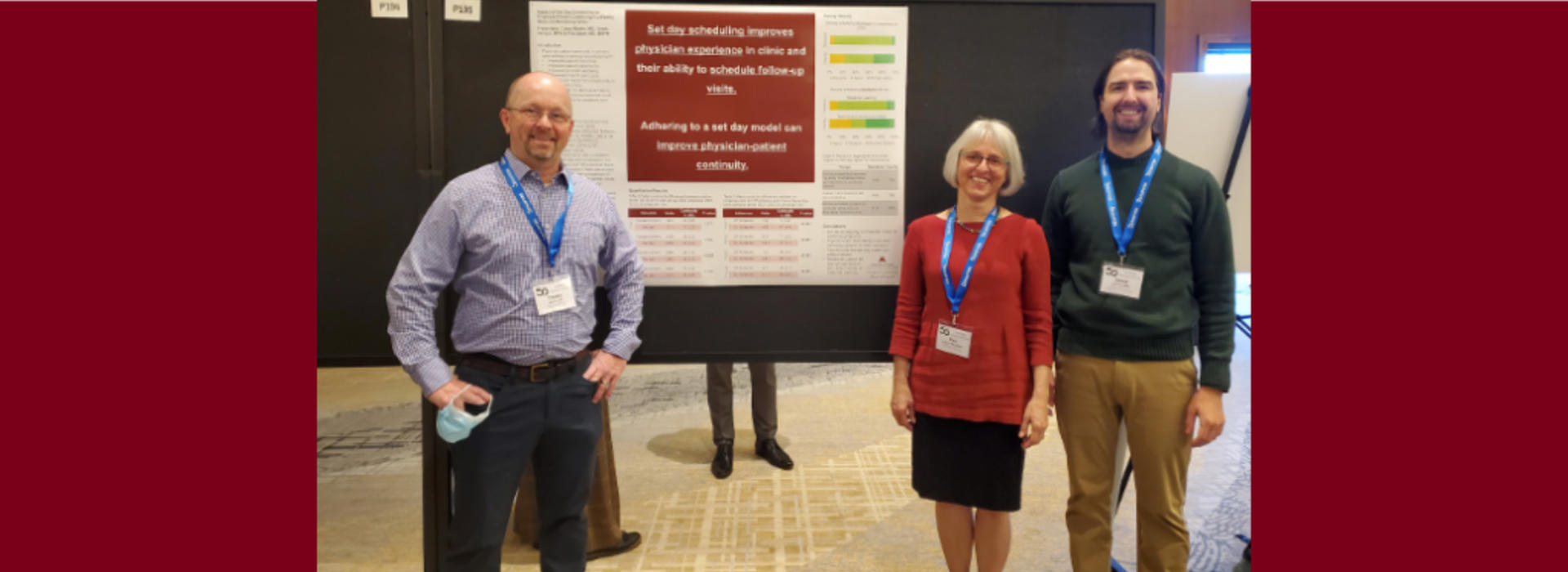Drs. Casey Martin and Pita Adam with Derek Hersch with their presentation poster