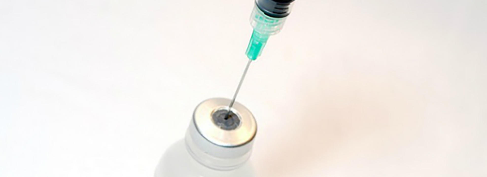 syringe and vax