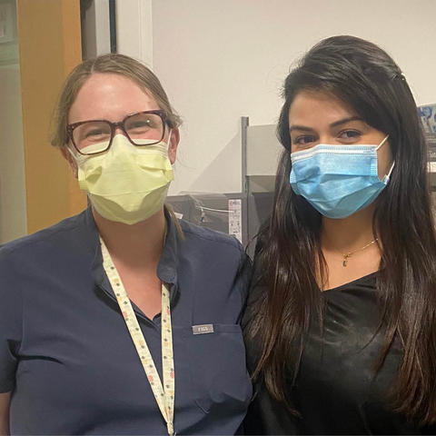 Physician Brittney Schultz and medical student Camila Jaramillo standing for a photo. 