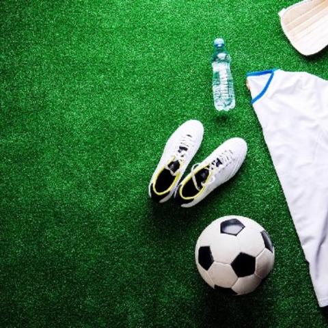 Soccer equipment on grass.