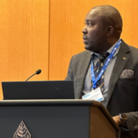 Dr. Christophe Mpirimbanyi presenting his findings