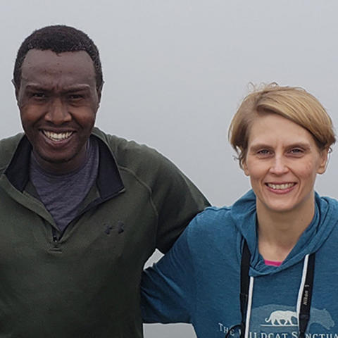 four anesthesiologists hiking in Uganda
