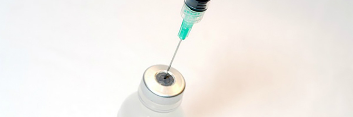 syringe and vax